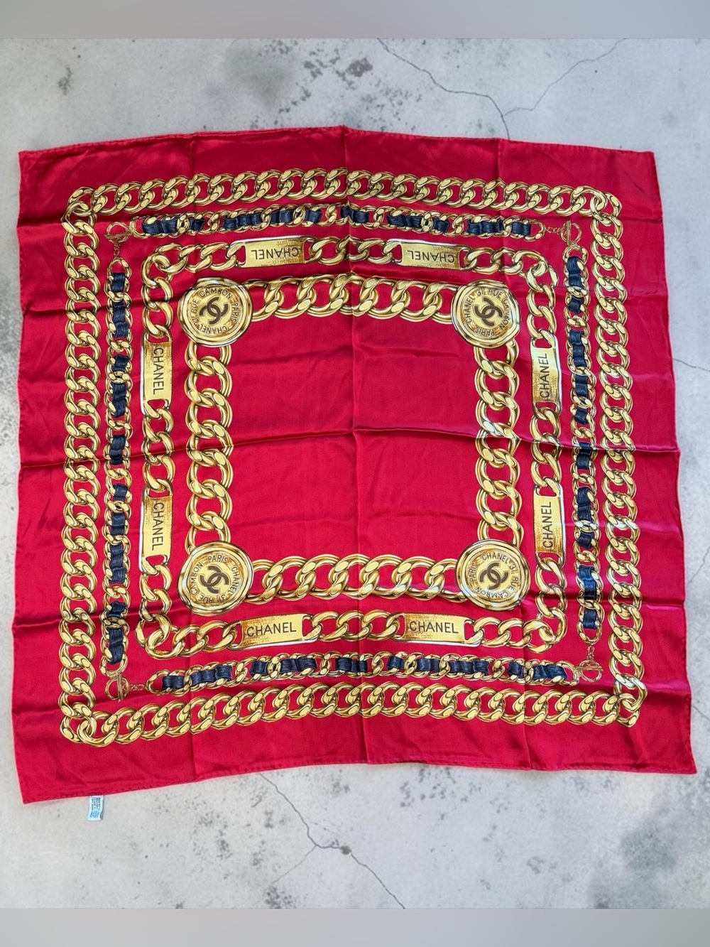 CHANEL Red Silk Scarf with Gold Chain Print